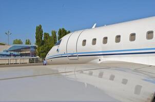 business plane parked at the airport photo