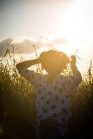 Fashion shot of a beautiful boho style girl on nature background. Boho, hippie. photo