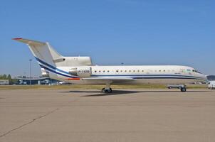 business plane parked at the airport photo