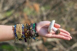 Fashion shot of a beautiful boho style girl on nature background. Boho, hippie. photo