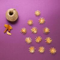 Christmas treats, Sliced dried organges fruit, cinnamon and wooden toys. photo