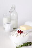 Dairy products on white table. Sour cream, milk, cheese, egg. selective focus. photo