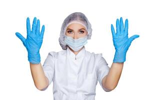 Women Doctor shows hands in sterile gloves isolated on white, Medical advertising concept. photo