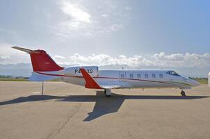 business plane parked at the airport photo