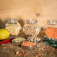 Raw cereals set on wooden background photo