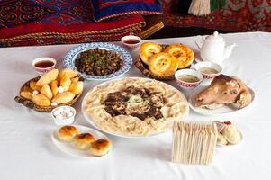 National Kazakh dishes, Beshparmak, Manty, Baursak photo