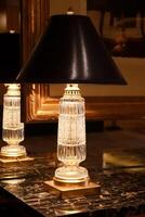 Decorative lamp on the marble table photo