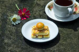 cake and tea for breakfast photo