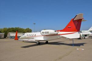 business plane parked at the airport photo