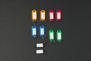 Collection of a key fob on black background photo