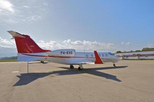 business plane parked at the airport photo