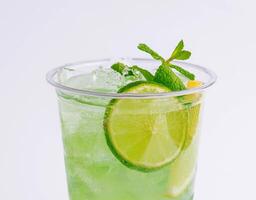 Citrus cocktail mojito with lime and mint photo