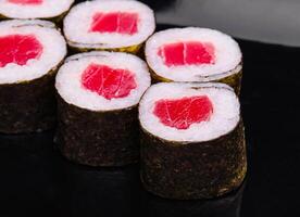 sushi maki rolls with tuna inside photo