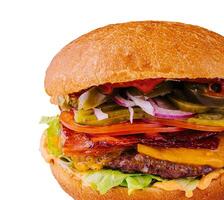 burger with beef, tomato, cheese, bacon and lettuce isolated photo