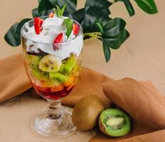 Serving of fresh rainbow fruit salad photo