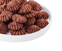 Stack of chocolate chip cookies on plate isolated photo