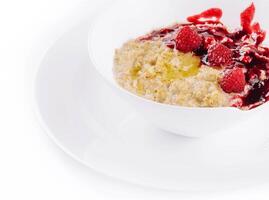 harina de avena rústico gachas de avena con frambuesas mermelada foto