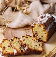 Freshly baked loaf of bread with raisins photo