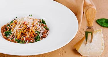 pasta with parmesan cheese close up photo