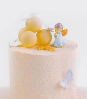 baby cake with angel isolated on white photo