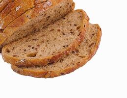 Flat-lay of freshly baked sourdough bread loaf and bread slices photo