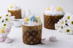 Artisanal easter cakes with colorful meringue toppings photo