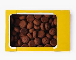 Box of chocolate cookies on white background photo