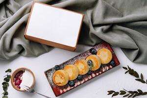 Elegant dessert presentation with blank menu card photo