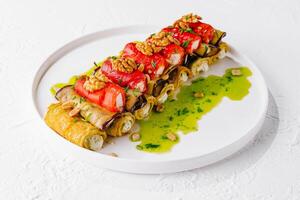 Gourmet stuffed chicken roll with vegetables and nuts photo