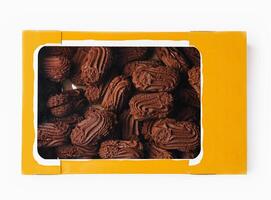 Box of chocolate cookies isolated on white photo