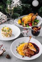 Festive holiday dinner spread with roasted chicken photo