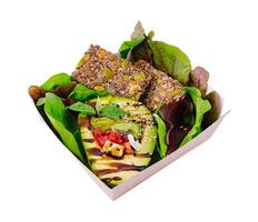 Healthy vegan lunch box with avocado and grains photo