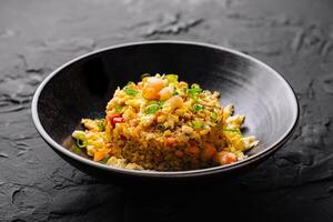 Delicious fried rice in bowl photo