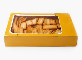 Box of assorted biscuits on white background photo