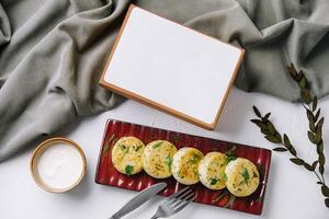 Cottage cheese pancakes with blank menu card photo