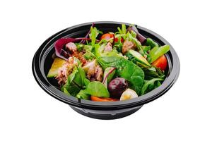 Fresh mixed salad in takeout container photo