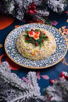 Traditional festive salad olivier on ornate plate photo