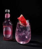 Elegant pink cocktail with grapefruit garnish photo