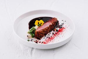 Gourmet seared steak with red wine reduction photo