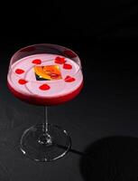 Elegant cocktail with heart garnishes photo