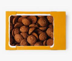 Box of chocolate cookies on white background photo