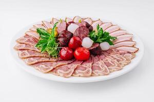 Assorted deli meat platter on white background photo