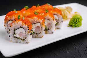 California sushi rolls on elegant white plate photo