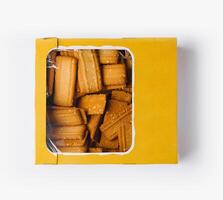 Top view of boxed butter cookies on white background photo