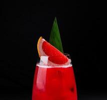 Tropical cocktail with fresh grapefruit slice photo