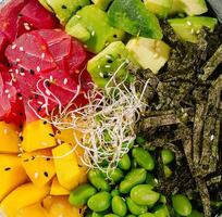 Colorful poke bowl macro background photo