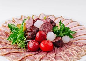 Assorted deli meat platter on white background photo