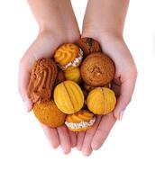 Handful of assorted cookies isolated on white photo