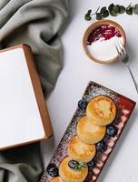 Elegant dessert presentation with blank box photo