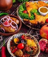 Traditional feast with roasted chicken and vegetables photo